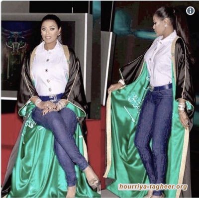 وصلة رقص مثيرة لفتاتين شبه عاريتين مع علم التوحيد